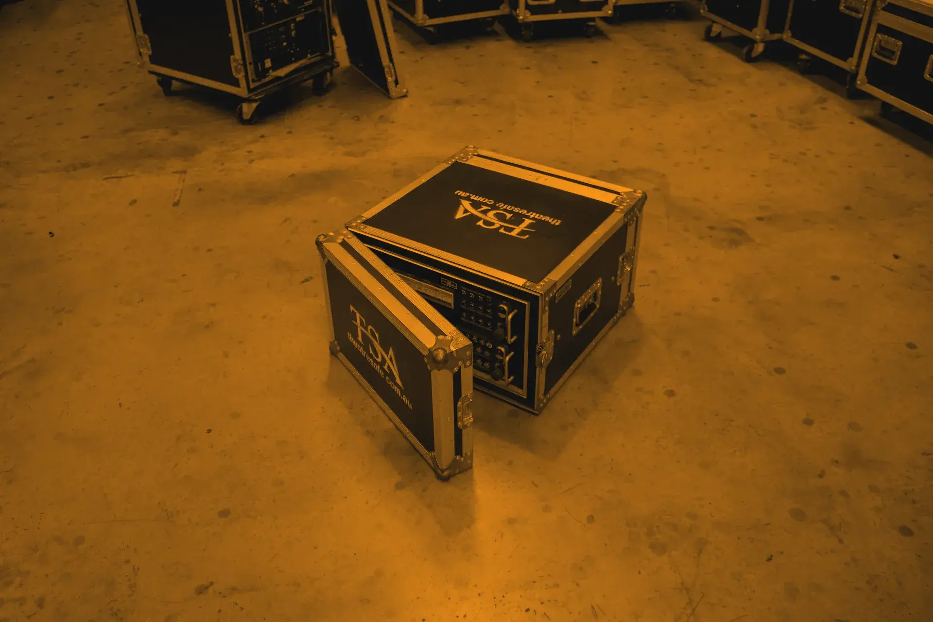 TSA touring control kit and rigging hire fleet packed in branded road cases, ready to ship nationally