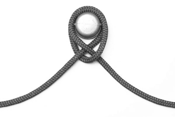 A clove hitch tied around a fixed object