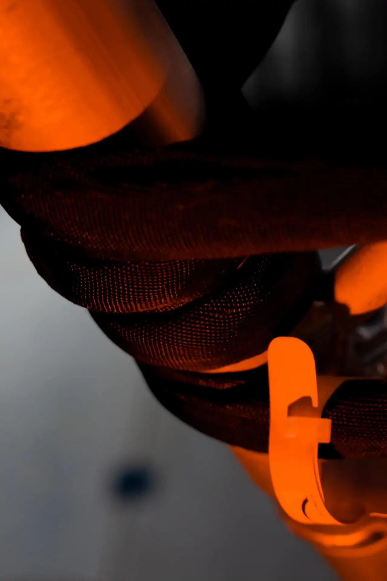 A soft steel round sling rigged to a load - the kind of heat-affected or permanent pick where steel earns its place over polyester.