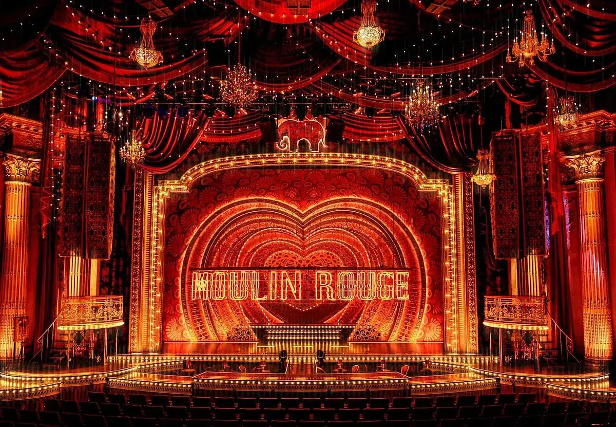 Moulin Rouge! The Musical integrated scenic and soft-goods systems