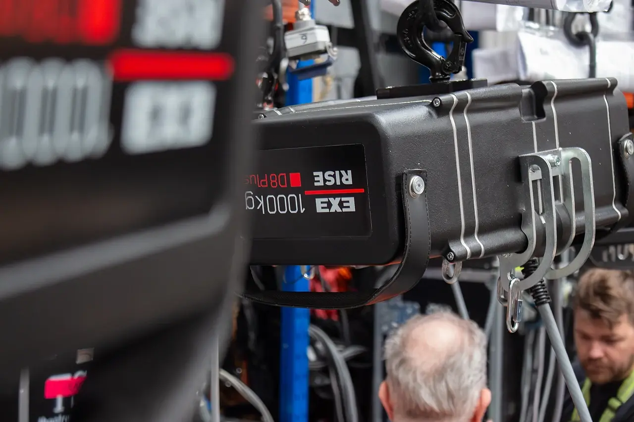 An EXE Rise 1000kg D8 Plus chain hoist with rated hook, prepped to hang